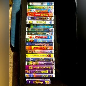 Lot of about 21 mostly clamshell kids Disney vhs tapes
